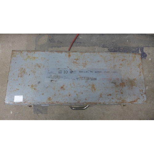 5068 - A cased Bachmayr PH65A 110v demolition breaker