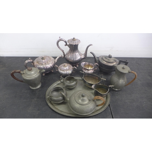 5069 - A quantity of assorted metal tea ware including tea pots, milk jugs and a serving tray