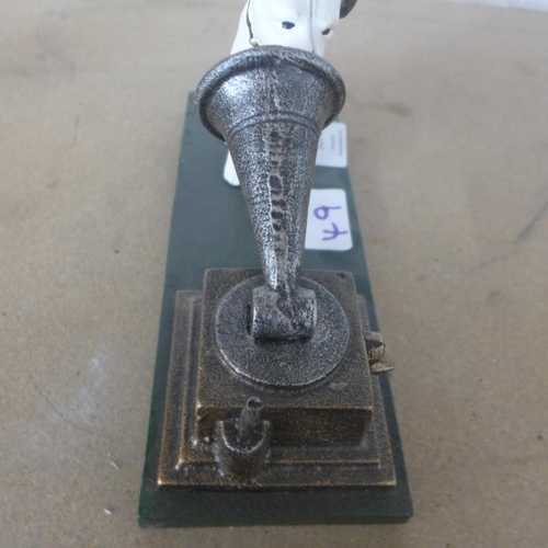 5074 - A cast metal HMV Nipper dog and gramophone ornament *This lot is subject to VAT
