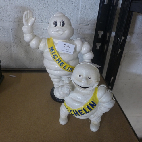 5081 - 2 cast metal Michelin Man money banks  *This lot is subject to VAT