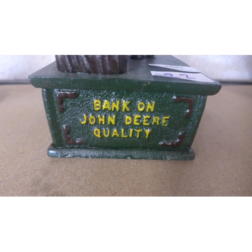 5082 - A cast metal John Deere money bank  *This lot is subject to VAT