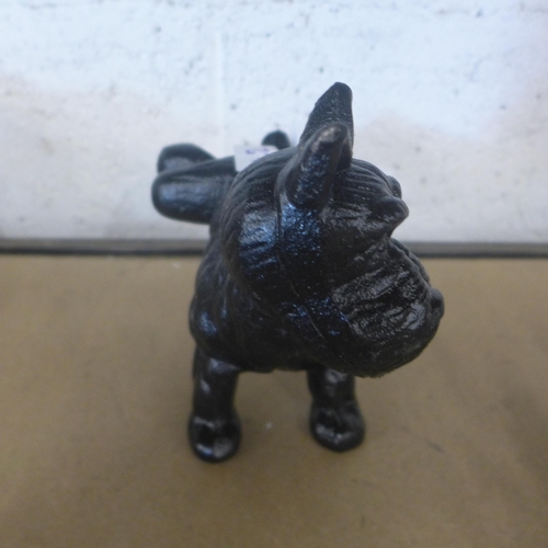 5088 - A cast metal urinating dog door stop  *This lot is subject to VAT
