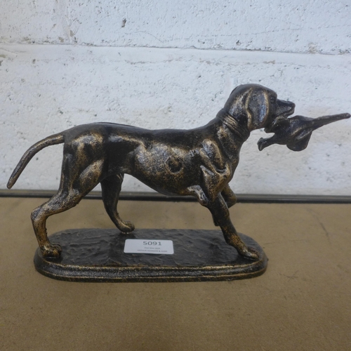 5091 - A cast metal Retriever figure and a cast metal greyhound figure *This lot is subject to VAT