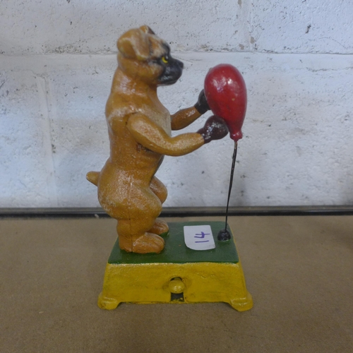 5092 - A cast metal Popeye figure and a cast metal  dog with a punching bag figure  *This lot is subject to... 