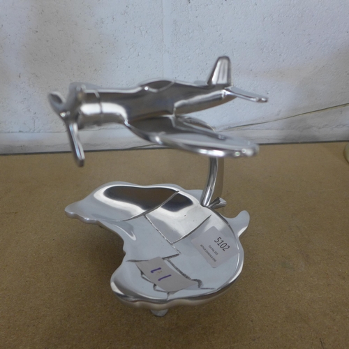 5102 - A polished aluminium plane and map trinket tray  *This lot is subject to VAT
