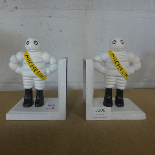 5106 - A pair of cast metal Michelin bookends  *This lot is subject to VAT