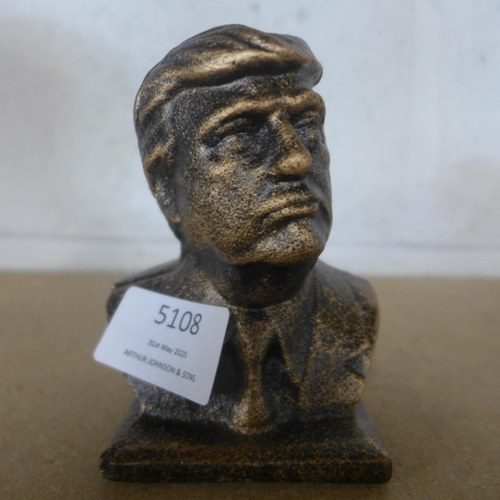 5108 - A small cast metal Donald Trump bust  *This lot is subject to VAT