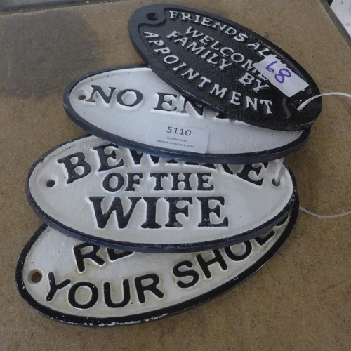 5110 - 4 oval cast metal signs including “friends always welcome family by appointment”, “no entry”, “bewar... 