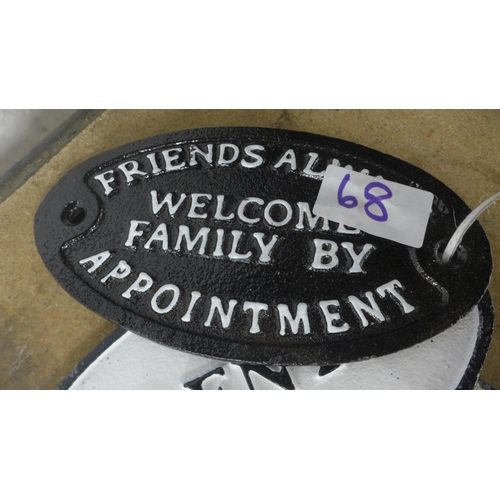 5110 - 4 oval cast metal signs including “friends always welcome family by appointment”, “no entry”, “bewar... 