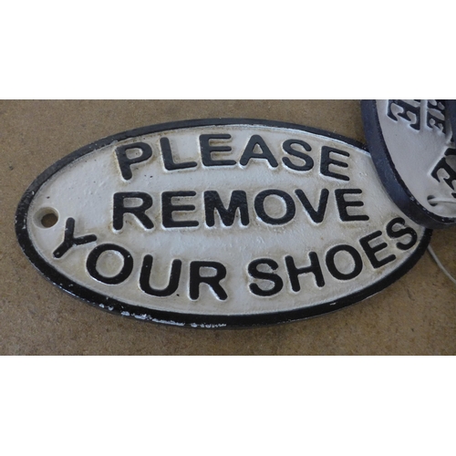 5110 - 4 oval cast metal signs including “friends always welcome family by appointment”, “no entry”, “bewar... 