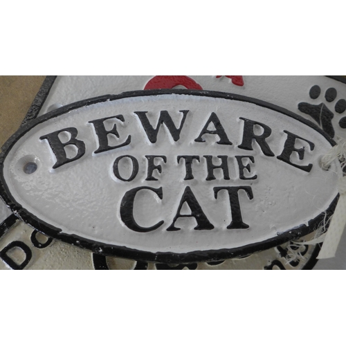 5111 - 3 cat related cast metal signs  *This lot is subject to VAT