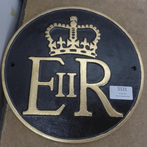 5121 - A cast metal Elizabeth II wall plaque and a cast metal Charles III wall plaque *This lot is subject ... 