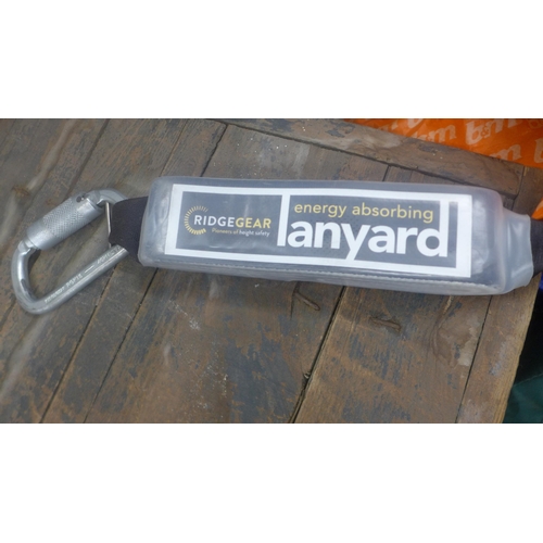 A RidgeGear climbing harness with safety lanyard