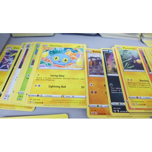 1000 Pokemon cards including rares and reverse holos