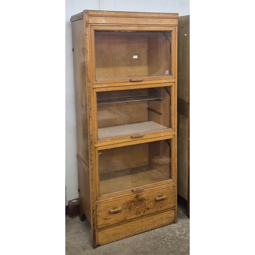 116 - A Dudley & Co. Ltd. oak haberdashery shop display cabinet