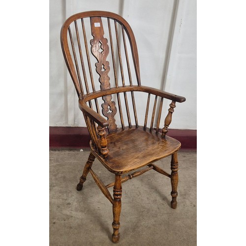 145 - A 19th Century elm and ash highback Windsor chair