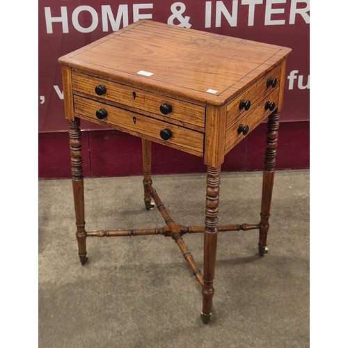 148 - A George IV satinwood and ebony inlaid two drawer side table