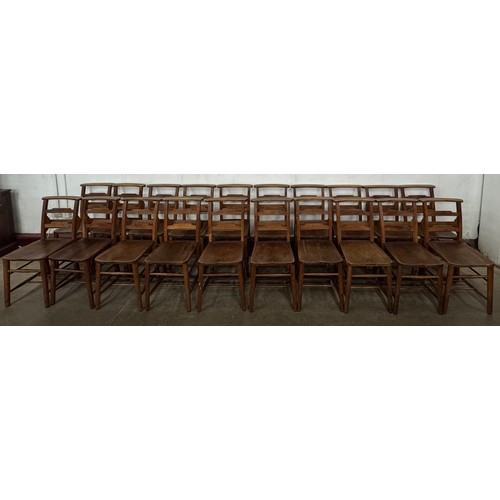 119 - A set of twenty early 20th Century beech chapel chairs