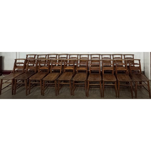 122 - A set of twenty early 20th Century beech chapel chairs