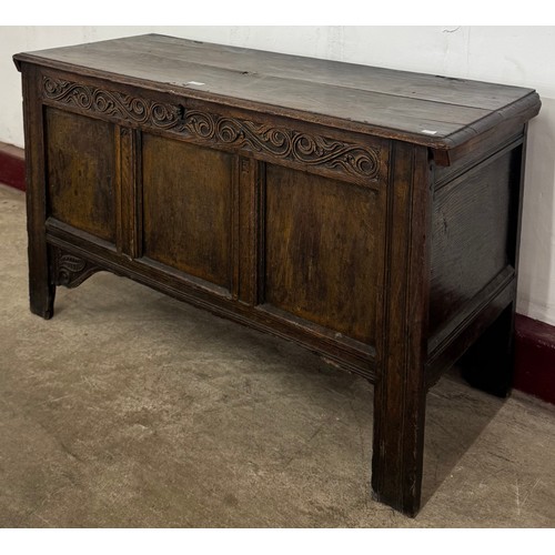 129 - A William III carved oak coffer