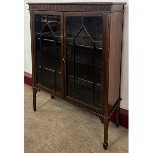 144 - An Edward VII mahogany two door bookcase