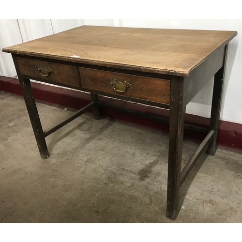 150 - A George III style oak two drawer pantry table