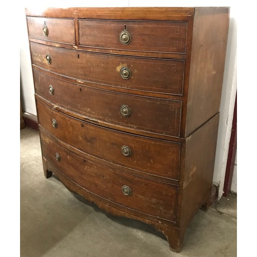 216 - A George III inlaid mahogany bow front chest of drawers