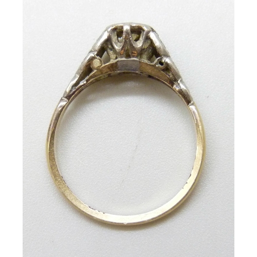 7038 - An 18ct gold and platinum set diamond ring, 2.2g, K/L