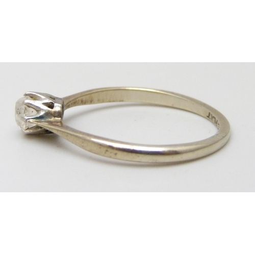 7051 - An 18ct gold and platinum set diamond solitaire ring, 1.7g, N
