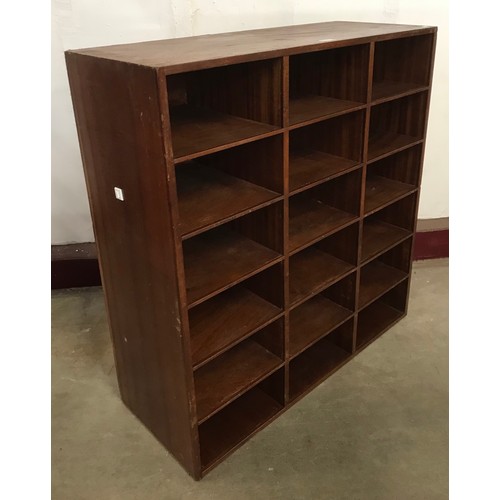 116A - A teak pigeonhole cabinet