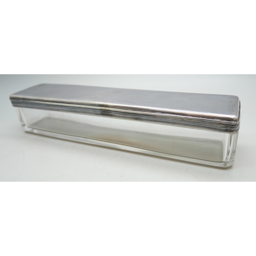 7246 - A white metal gallery style pen tray, possibly Paris mark, 20.8cm, and a glass box with white metal ... 