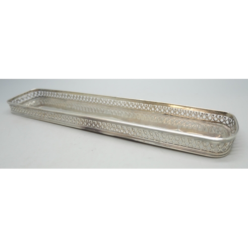 7246 - A white metal gallery style pen tray, possibly Paris mark, 20.8cm, and a glass box with white metal ... 