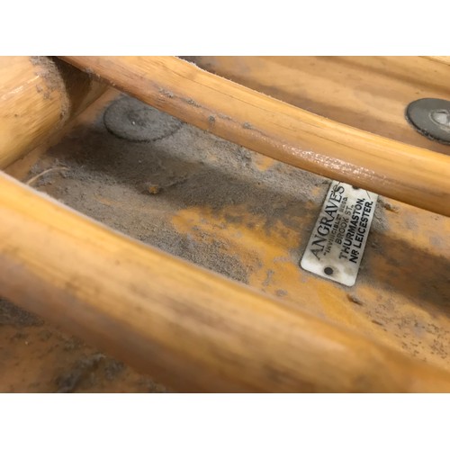 244B - A pair of Angraves Invincible bamboo revolving conservatory ball chairs and a footstool