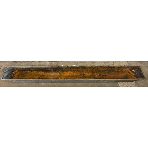 245 - A large galvanised trough