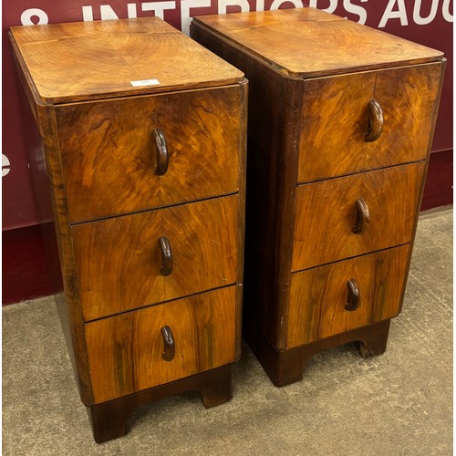 133 - A pair of Art Deco walnut bedside chests