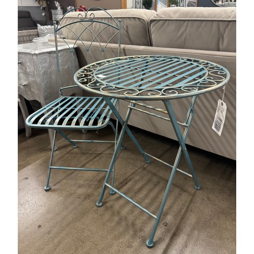 3049 - A round metal bistro table and chair