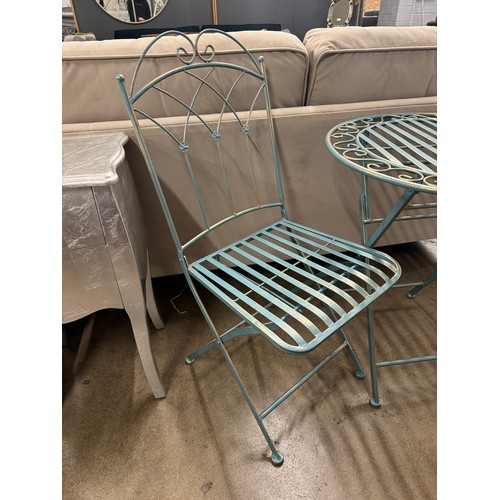 3049 - A round metal bistro table and chair