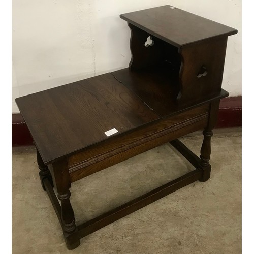 171 - An oak telephone seat