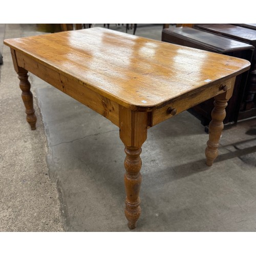 181 - A Victorian style pine single drawer farmhouse kitchen table