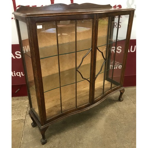 168 - An early 20th Century oak display cabinet