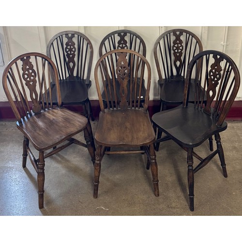 187 - A set of six elm and beech wheelback kitchen chairs