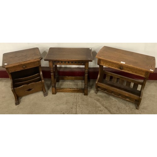 179 - A 17th Century style oak stool and two oak magazine racks