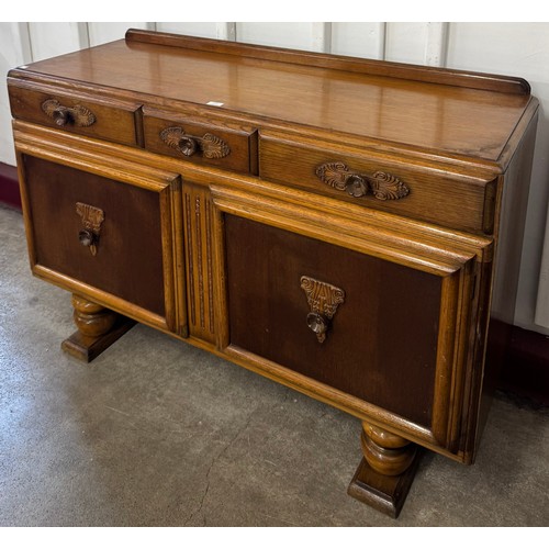 191 - An Art Deco oak sideboard