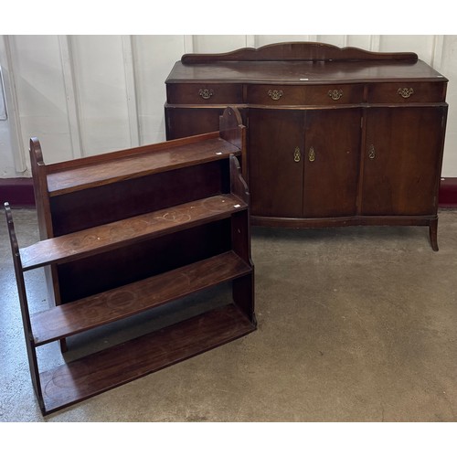 192 - An oak sideboard, an oak open bookcase and a set of oak wall hanging shelves