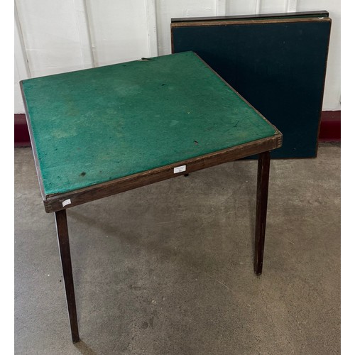 194 - Three early 20th century oak folding card tables