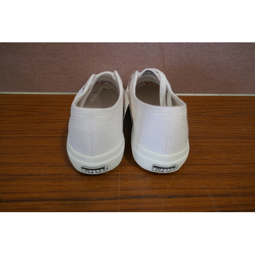 6187 - Supergra white trainers x 3, various sizes and a pair of 32 degrees Cool sliders, size small *This l... 