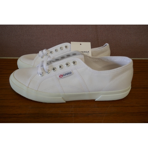 6188 - Supergra white trainers x 4, size UK 9.5 *This lot is subject to VAT