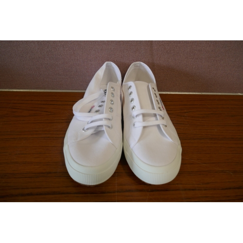 6188 - Supergra white trainers x 4, size UK 9.5 *This lot is subject to VAT