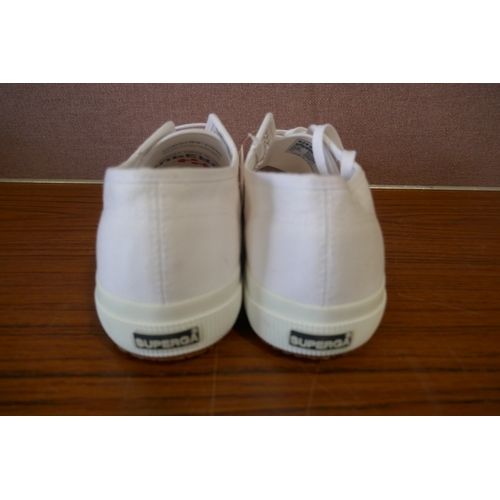 6188 - Supergra white trainers x 4, size UK 9.5 *This lot is subject to VAT