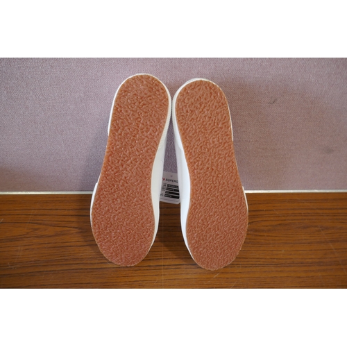 6188 - Supergra white trainers x 4, size UK 9.5 *This lot is subject to VAT
